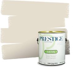 a white paint with the words prestige written on it and an image of a can