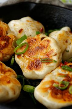 some food is being cooked in a skillet