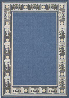 a blue rug with an intricate border