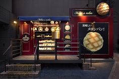 an image of a food stand at night