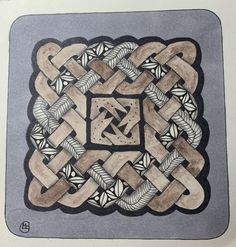 a drawing of an intricate design on a piece of paper