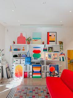 a living room filled with lots of colorful furniture