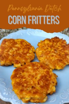 Blue plate with three corn fritters on it Pennsylvania Dutch Corn Fritters, Southern Corn Fritters Recipe, Sweet Corn Pancakes, Corn Patties Fried, Fresh Corn Fritters, Corn Latkes, Sweet Corn Fritters Recipe, Jiffy Mix Corn Fritters Easy, Fritter Batter Recipe