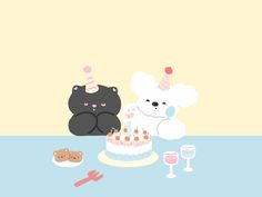 two teddy bears sitting next to a birthday cake and wine glass on a table with other items