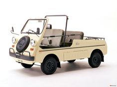 an old model car with the hood up and seats folded down, on a white background