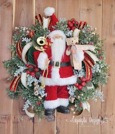 a christmas wreath with santa clause and decorations