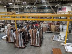 many different types of wood in a warehouse