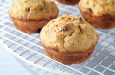 several muffins sitting on a cooling rack