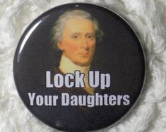 a button with the words lock up your daughters on it, and an image of george washington