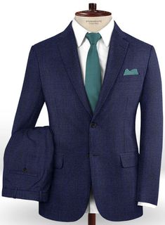 Make an entrance in our elegant Caccioppoli Dapper Dandy Olierr Blue Wool Suit. Crafted from 70% wool and 30% mohair, the exemplary blue hue of the suit undertones a subtle yet eye catching texture that enhances its appearance making it easy to style. The suit can be easily dressed up or down depending upon the occasion, be it weddings, formal meetings, events or casual get together. Simply team the suit up with a matching waistcoat, white shirt, plain tie and black monk strap shoes. 
 
 Look In Tailored Blue Wool Suit, Blue Wool Three-piece Suit With Notch Lapel, Tailored Navy Wool Suits, Blue Wool Suits For Workwear, Blue Wool Suit With Pressed Crease, Blue Wool Suits For Work, Blue Wool Three-piece Suit With Pressed Crease, Blue Wool Suits With Pressed Crease, Blue Wool Suits For Formal Occasions