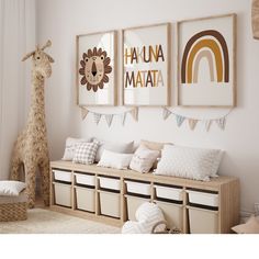 a child's room decorated in neutrals and whites with pictures on the wall