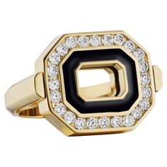 This stunning Art Deco style Cocktail ring has .66 carats of GH VSI Diamonds, Black Enamel and set in 18 Karat Yellow Gold (15+ grams). Uniquely designed, coined the ‘Flip Ring,’ this octagon shaped ring sits ‘east - west’ is two rings in one, with sparkling round brilliant diamonds accented by a black enamel halo and framed in gold on one side - and two sharp black enamel lines framed with the deep 18 Karat gold on the other. A hinge on each side locks it into place so it stays flat on your hand. Part of designer Andrew Glassford’s ‘Museum Series,’ this convertible ring is a true statement piece and a chic addition to anyone’s jewelry collection. This ring is a size 6.5. This ring can also be custom ordered - made with multiple enamel colors and / or stone choices. Due to the design, fit Luxury Black Diamond Enamel Ring, Luxury Yellow Gold Diamond Ring With Black Enamel, Luxury White Gold Enamel Ring For Formal Occasions, White Gold Luxury Enamel Ring For Formal Occasions, Luxury Diamond Enamel Ring With Polished Finish, Luxury Octagon Ring With Bezel Setting, Luxury Jewelry With Halo Setting, Luxury Black Enamel Ring, Luxury Enamel Ring With Diamond Accents