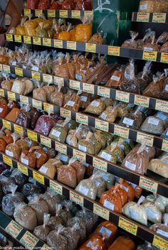 an assortment of food items on display in a store