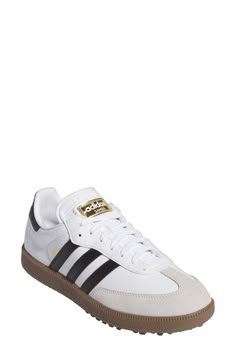 a white and black adidas sneakers