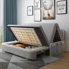 an open storage box sitting on top of a bed