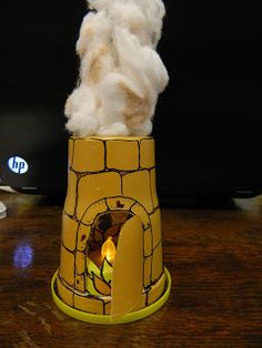 the cotton is being thrown out of the fire place into the air and onto the table