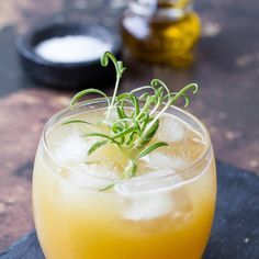 a close up of a drink in a glass on a table