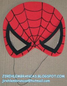 a close up of a spider man mask