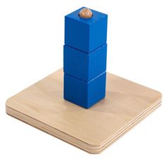 a wooden block with a ball in the middle