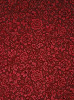 a red background with flowers and leaves on the bottom, it looks like an old fashioned wallpaper