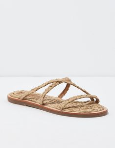 Round toe/Woven straps & footbed/Not eligible for promotions | Only ships within the USA Natural Sandals With Woven Sole And Single Toe Strap, Natural Color Sandals With Braided Straps And Round Toe, Adjustable Natural Sandals With Textured Footbed, Natural Color Round Toe Sandals With Braided Straps, American Eagle Outfitters, Women's Jeans, American Eagle, Salt, Women Jeans