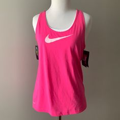 New With Tags Pink Crew Neck Activewear For Spring, Pink Crew Neck Sporty Tank Top, Sporty Pink Crew Neck Tank Top, Spring Nike Workout T-shirt, Nike Workout T-shirt For Spring, Basic Pink Sports Top, Nike Basic Tops For Spring, Nike Tops For Spring Workout, Pink Cotton Workout Top