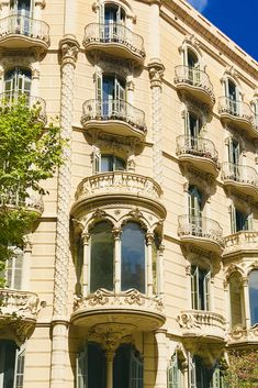 an ornate building with balconies and windows