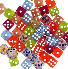 many different colored dices with white dots on them