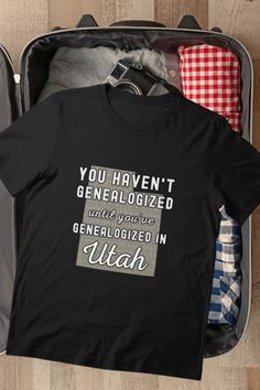 Open suitcase with black TShirt on top with map of Utah and text You Haven't Genealogized until you've Genealogized in Utah Salt Lake City, Lake City, Utah, Classic T Shirts, Salt, Lake