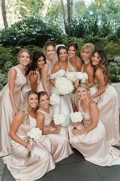 a group of bridesmaids posing for a photo