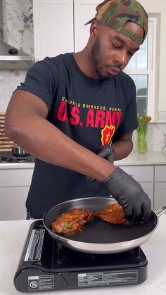 a man cooking food on top of a stove