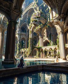 a person sitting on the edge of a pool in an ornate building with columns and arches