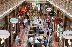 an overhead view of people shopping in a mall