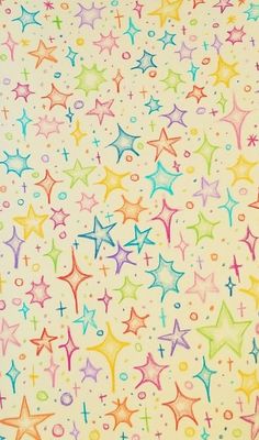 an image of colorful stars and dots on a white background with multicolored colors