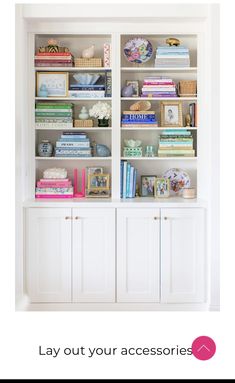 a white bookcase filled with lots of books