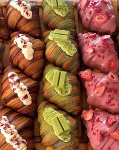 there are many different types of pastries on display