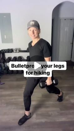 a woman in black shirt and cap standing on wooden floor next to gym equipment with text overlay that reads, bulletpro your legs for hiking