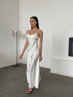 White satin dress. Womens Stunning silk slip dress V-neck. Maxi Satin slip dress for events. Briedsmaids white silk dress. Material: Silk + polyester Colours: Milky White, Ivory, Emerald, Royal Blue, Black SIZE/LENGTH: the length WITHOUT STRAPS XS,S,M,L- 118 cm (46,45'') We can customize length for you as well. Model on the Foto 171cm-67,3'', S size PRODUCT CARE - It is recommended to handwash 30oC. -twist carefully Feel Free to Ask Any Question about Sizing and Fit. FREE DELIVERY WORLWIDE! Elegant Silk Dress With Satin Finish For Evening, Elegant Satin Dress With Spaghetti Straps For Evening, Elegant Satin Dress With Spaghetti Straps, Elegant Evening Satin Dress With Spaghetti Straps, Elegant Satin Evening Dress With Spaghetti Straps, Elegant Modal Satin Evening Dress For Wedding, Elegant Modal Satin Dress For Wedding, White Satin Dress With Bias Cut, Elegant Satin Mini Dress For Evening