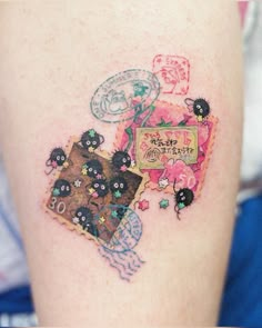 a woman's thigh with an animal themed tattoo on it