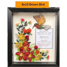 a shadow box with flowers in it and a poem written on the bottom frame,