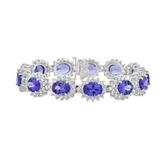 td {border: 1px solid #ccc;}br {mso-data-placement:same-cell;} 9x7mm Blue AAAA Tanzanite Bracelet Oval shape 25.46 ct with 5.94 cttw Diamond in 14K WG Product Information SKU B2046/1 Metal Type 14K Metal Color WG Ring Style - Primary Stone Gemstone Name Tanzanite Gemstone Species Zoisite No. Of Gemstones 13 Gemstone Shape Oval Gemstone Color Blue Gemstone Grade AAAA Gemstone Clarity VVS Gemstone Weight 25.46 Gemstone Size 9x7 Gemstone Composition Natural Gemstone Treatment Heated Origin Tanzania Tanzanite Bracelet, Tanzanite Jewelry, Tanzanite Stone, White Gold Bracelet, Tanzanite Gemstone, Pretty Bracelets, Ring Style, Cute Bracelets, Fantasy Jewelry