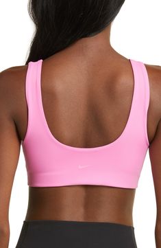 Get into the zone on and off the pickleball court wearing this stretchy, minimalist sports bra with a tonal logo on the back. Elasticized straps Lined 80% polyester, 20% spandex Machine wash, line dry Imported Sports Bra With Padded Back, Sports Stretch Bra With Padded Back, Padded Back Stretch Sports Bra, Padded Back Activewear For Yoga, Stretch Sports Bra With Padded Back For Gym, Fitted Sports Bra With Padded Back, Solid Sports Bra With Comfort Fit, Solid Sports Bra, Bra Friendly, Sporty Solid Color Bra For Gym