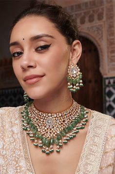 Introducing the epitome of elegance and charm: our bridal polki necklace set, a timeless treasure destined to adorn the neck of a radiant bride! Crafted with the finest uncut polkis, each one gleaming with unparalleled brilliance, and embellished with natural mint stones delicately dangling from its base, reminiscent of ethereal blossoms swaying in a gentle breeze. Wrap yourself in the splendor of tradition and beauty with this exquisite necklace set, and let your inner glow shine brighter than ever on your special day! Necklace Closure - Adjustable Dori Earrings Closure - Push Back Royal Necklace, Edgy Jewelry, Polki Necklace, Wedding Dresses For Girls, Stylish Party Dresses, Silver Jewelry Fashion, Pastel Wedding, Couple Photography Poses, Indian Jewelry