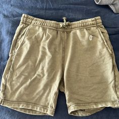 Khaki Cotton Shorts By Todd Snyder/Converse Ss Casual Green Shorts With Short Inseam, Khaki Cotton Lounge Shorts, Khaki Relaxed Fit Shorts For Loungewear, Khaki Cotton Shorts For Loungewear, Cotton Khaki Shorts For Loungewear, Casual Khaki Shorts With Short Inseam, Casual Khaki Shorts With Elastic Waistband, Khaki Short Length Loungewear Bottoms, Khaki Short Length Bottoms For Loungewear