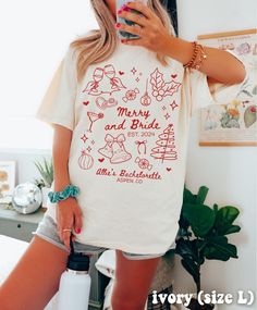 a woman taking a selfie while wearing a merry and bridal t - shirt