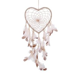 a white heart shaped dream catcher with feathers hanging from it's side and the words ebay below it