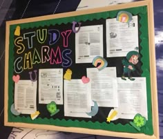 a bulletin board that has some papers on it with the words study charms attached to it