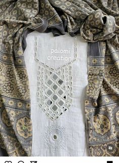 an embroidered shirt with the words palomi creation on it