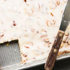 a pan with some food on it and a spatula next to it, ready to be eaten