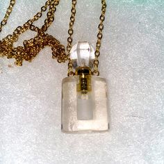 Long 24” Quartz Perfume Bottle Necklace. Necklace Features Real Quartz Perfume Bottle. Necklace Is Long 24”. Necklace Is Silver Plated With 18kt Gold. Comes With Gift Box. Gold Rectangular Pendant Necklace For Keepsake, Gold Elegant Charm Necklaces For Healing, Elegant Glass Necklace For Keepsake, Elegant Glass Keepsake Necklace, Bottle Necklace, Necklace Necklace, Hand Crafted Jewelry, Crafted Jewelry, Perfume Bottle